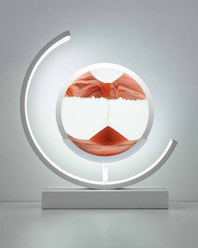 Table lamp with hourglass design - sand time effect in white and red in shape of a moon