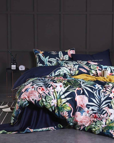 Dark blue Rio Bedding with ornaments in front of a grey wall